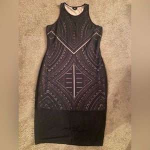 Spandex Dress comes in Black and White with an underlining of Beige.